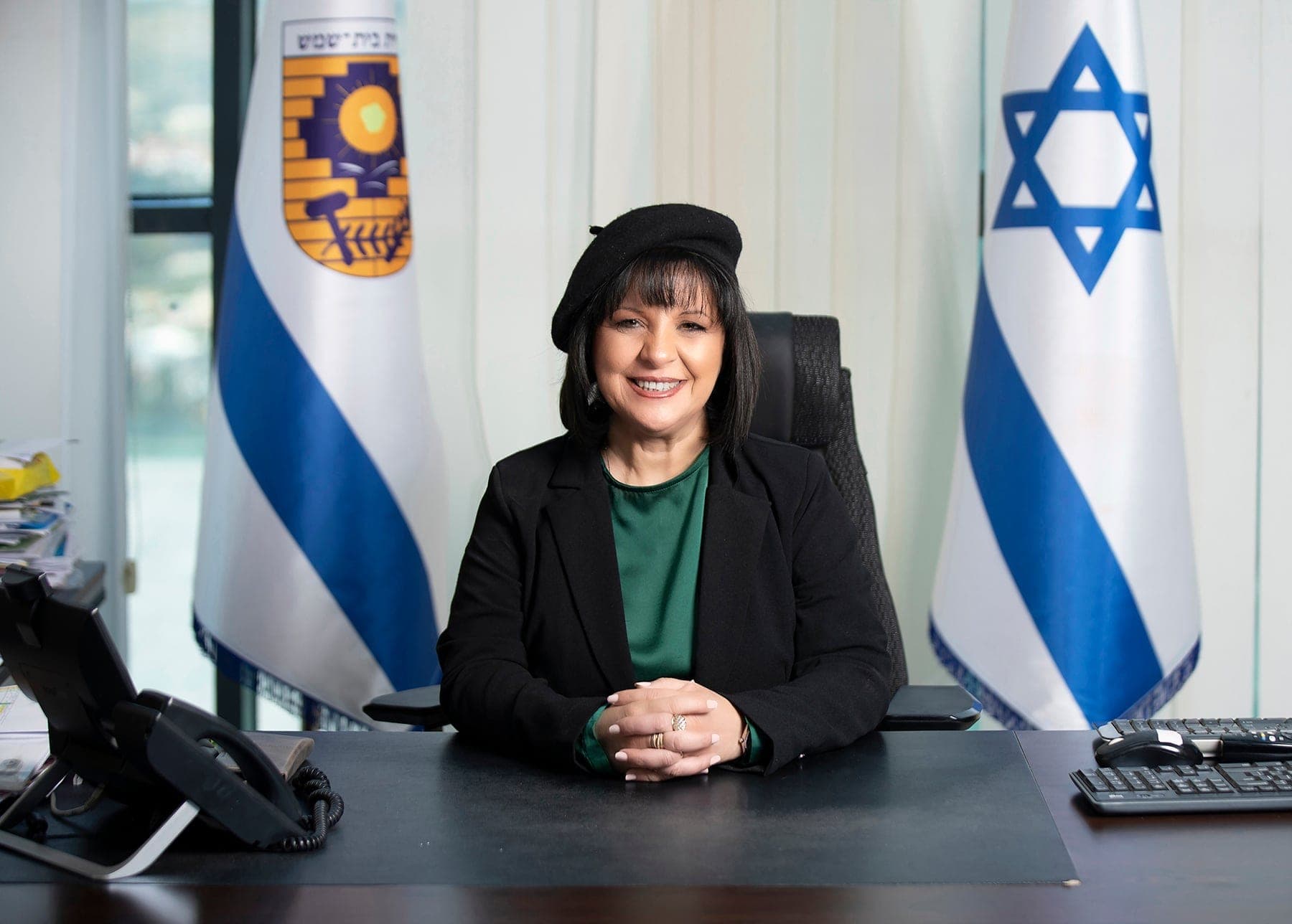 The final result: a portrait of Beit Shemesh Mayor Aliza Bloch in her office, beside the flags of Israel and the city, by Sharon Gabay