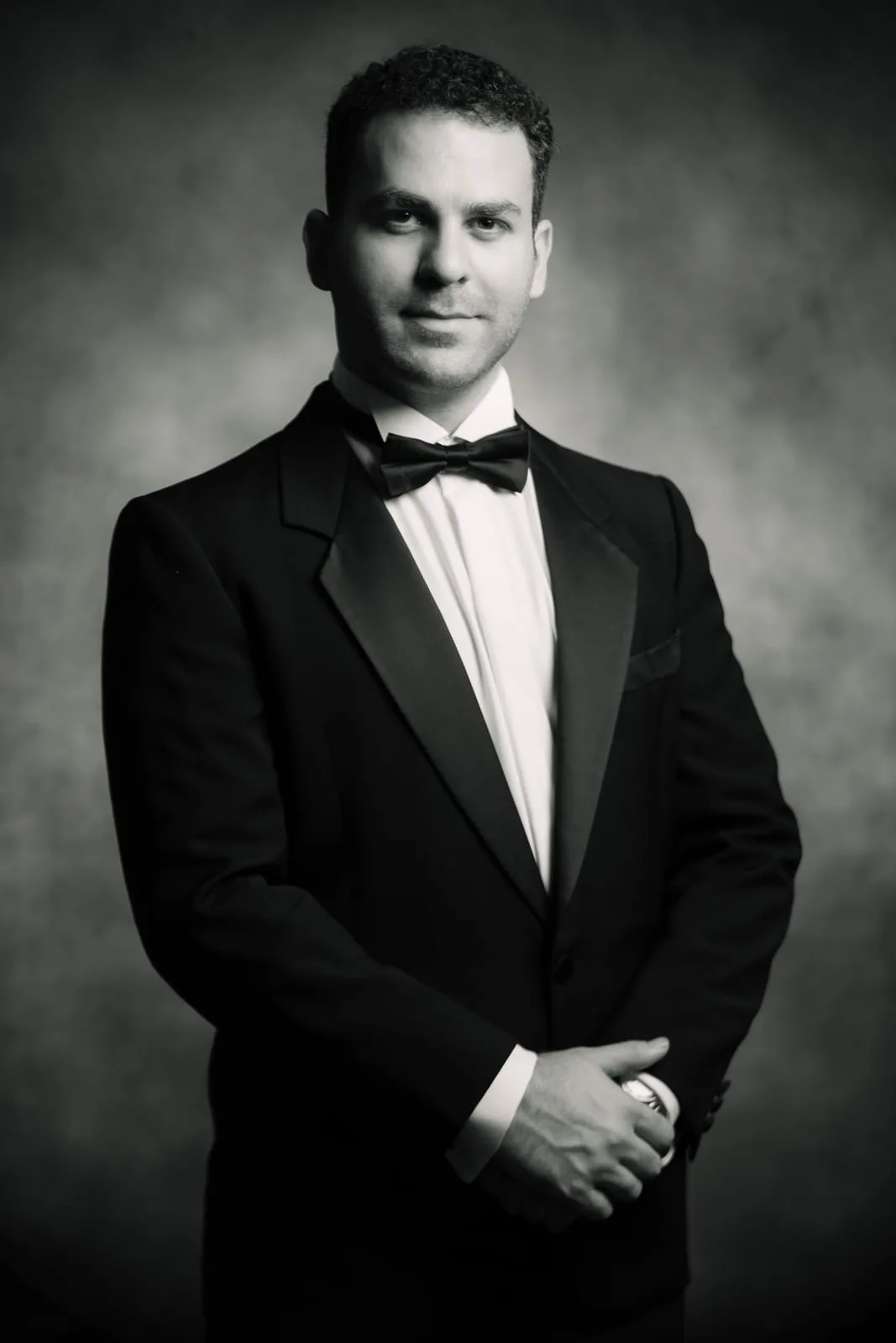 Headshot of a singer or cantor in a tuxedo in black and white, a classic and elegant presence — Sharon Gabay, headshot photographer
