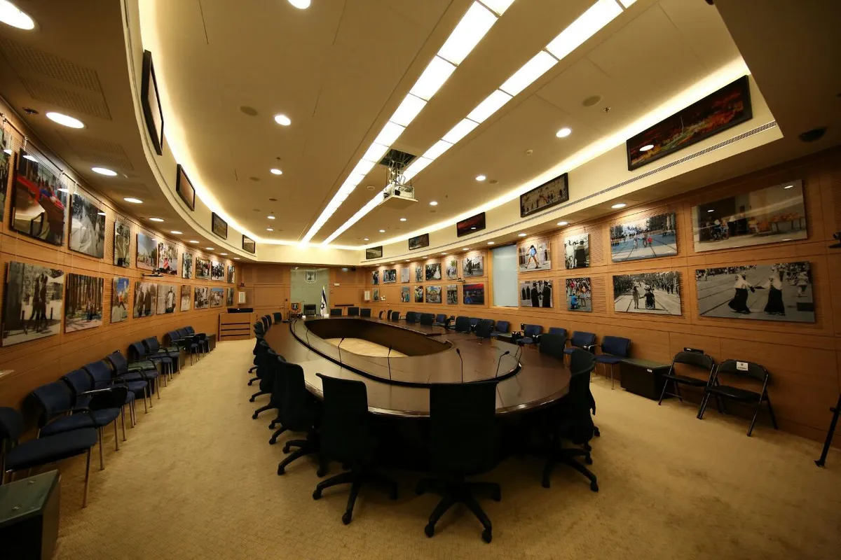 The Knesset committee hall wrapped in Sharon Gabay's “Jerusalem — Then and Forever” exhibition photographs, 2016