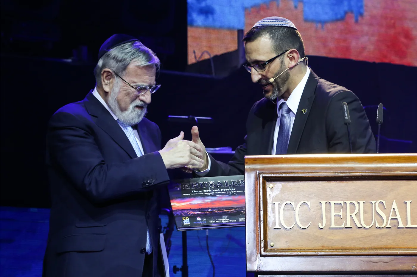 The late Rabbi Lord Jonathan Sacks, former Chief Rabbi of the UK, with Rabbi Doron Perez and Sharon Gabay's previous book